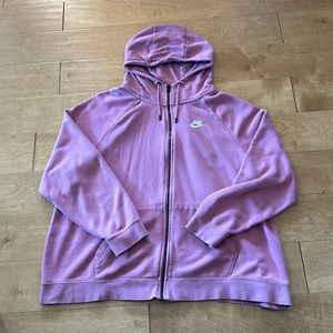 Pink Nike zip up jacket.